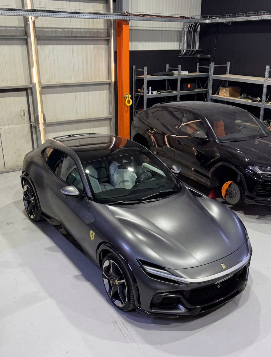 Ferrari Purosangue in satin grey next to a Lamborghini Urus at BRITFIX Dubai