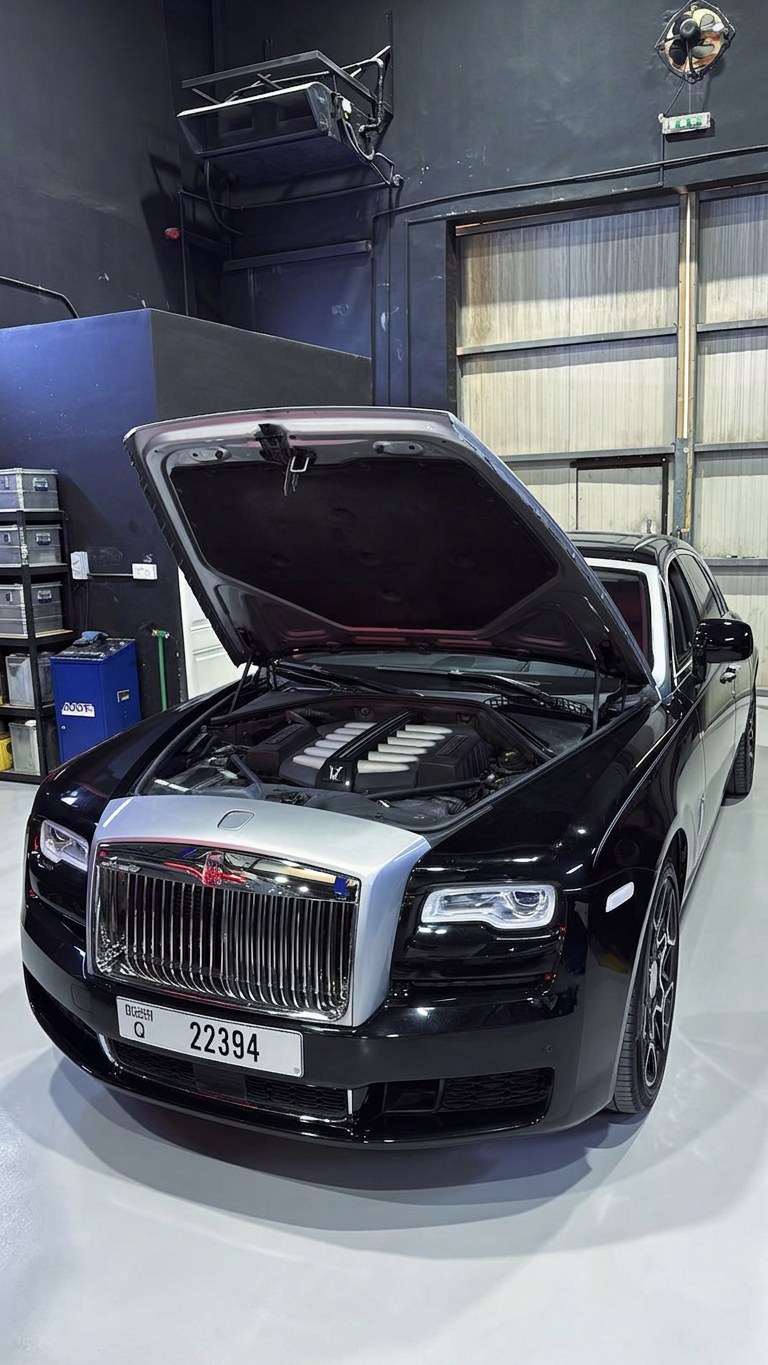 Rolls-Royce Ghost with the bonnet open for engine bay inspection at BRITFIX
