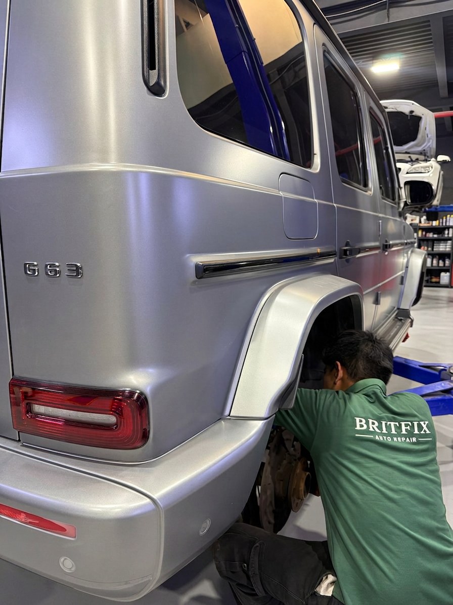 BRITFIX technician changing brakes on a Mercedes-AMG G63 in Al Quoz, Dubai