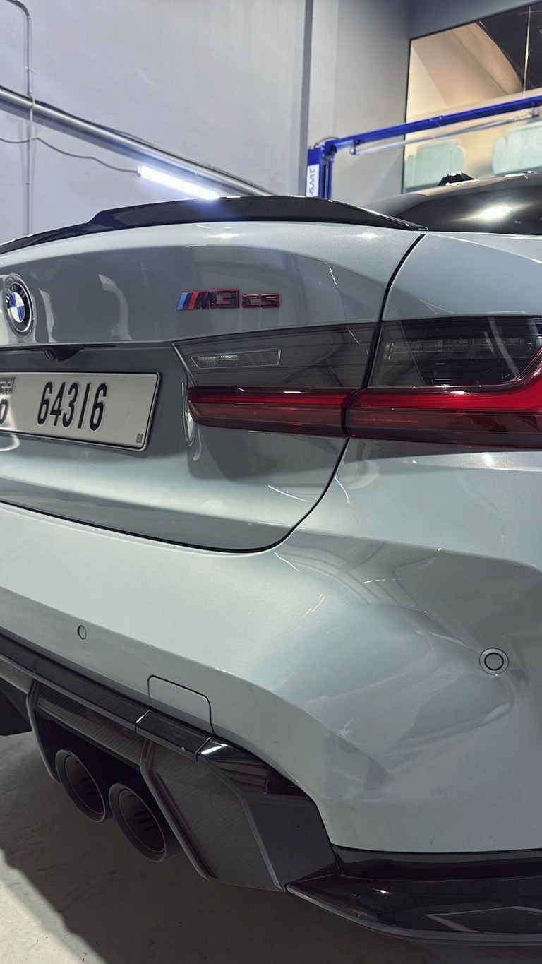 BMW M3 CS with carbon diffuser on the ramp at the BRITFIX workshop