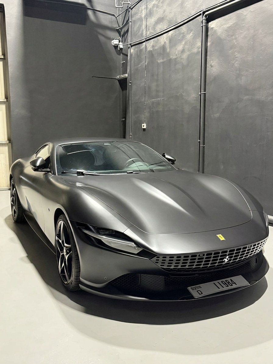 Satin grey Ferrari Roma at the BRITFIX workshop in Al Quoz, Dubai