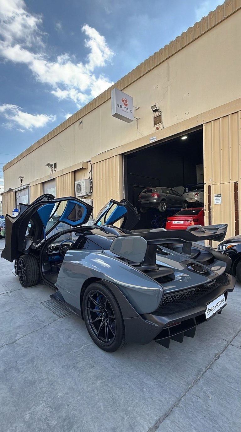 McLaren Senna with doors open outside the BRITFIX Auto Repair workshop in Al Quoz Dubai